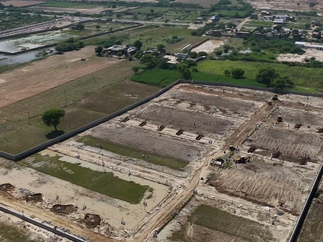 Plots marked out inside the boundary wall at Swarn Nagri Vistar