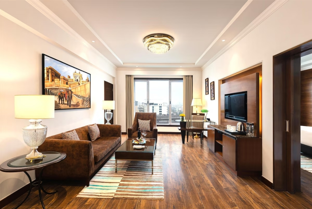 Premium suite living and dining room — Radisson Jaipur City Center