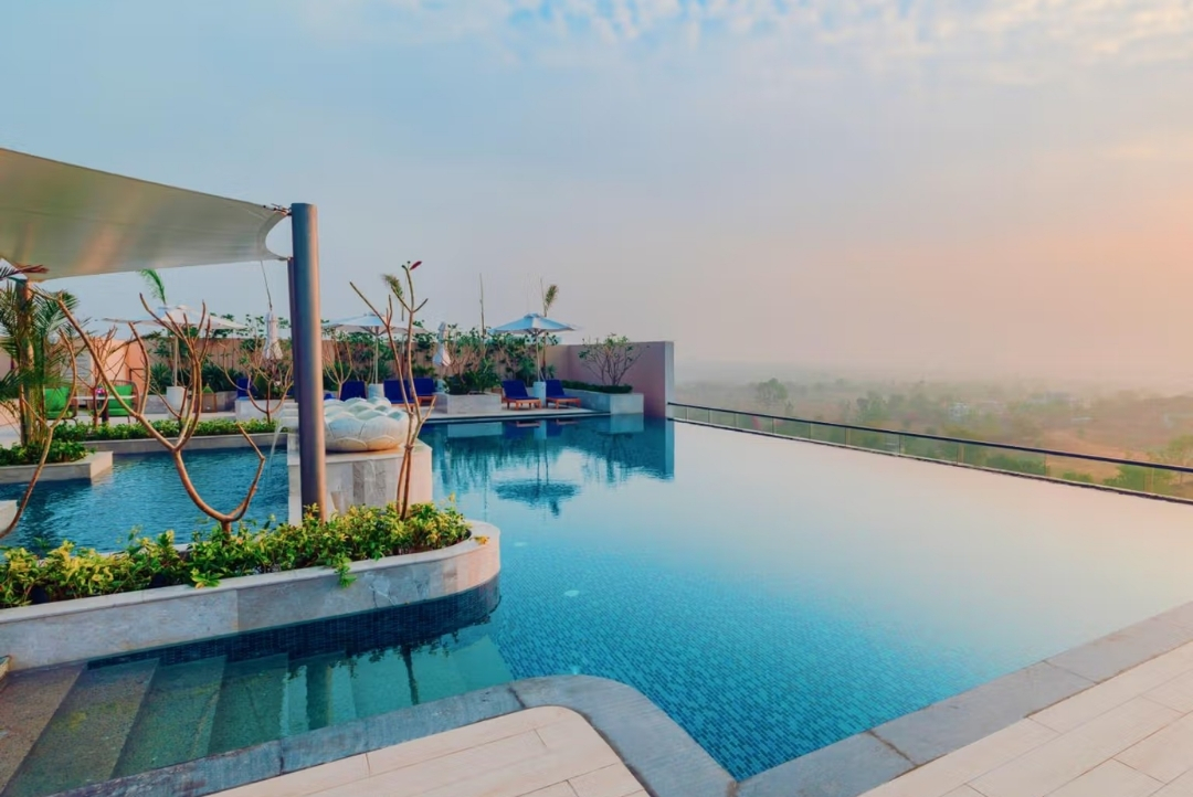 Taj Amer, Jaipur — rooftop pool at sunset