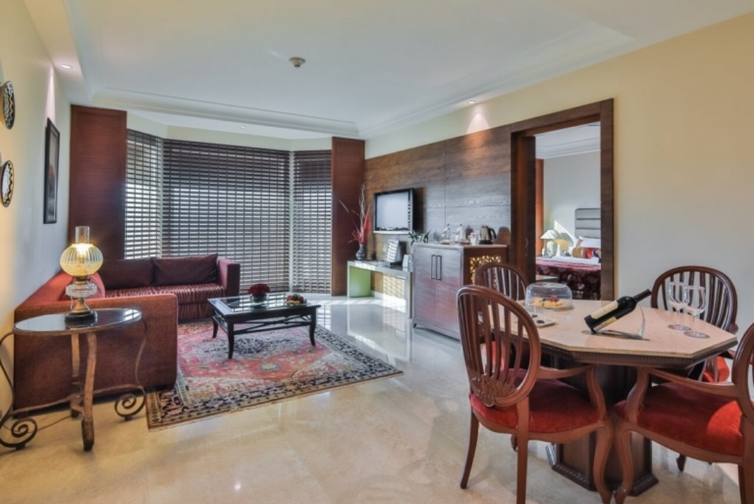 Suite living and dining room — The LaLiT Jaipur