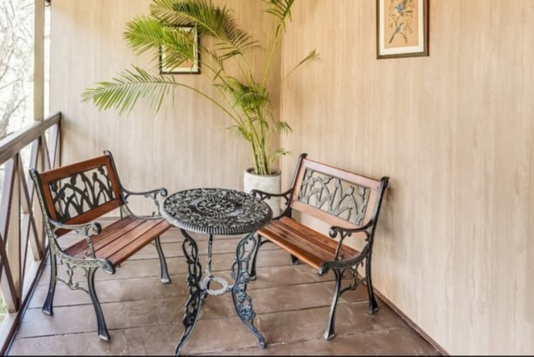 Private balcony seating — The Tree House Resort, Jaipur