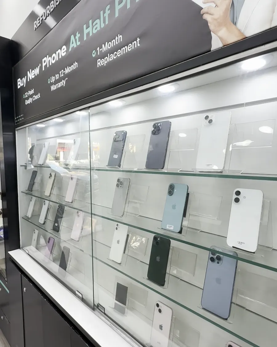 A glass wall of smartphones at the Cashify store on MI Road, Jaipur