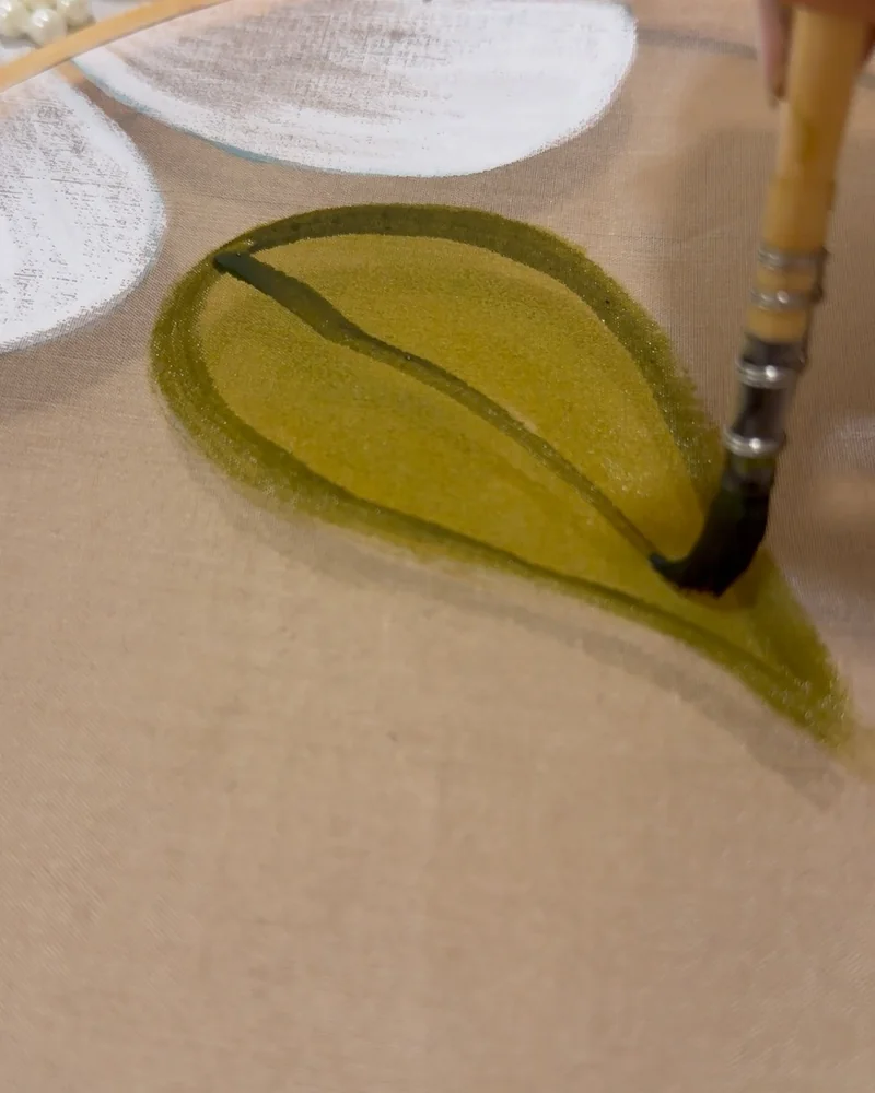 Painting the veins of an olive leaf